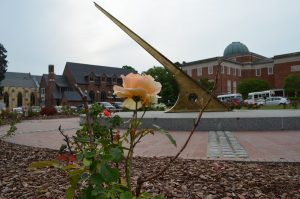 Blooming flower at iconic Sundial in front of Morehead Planetarium