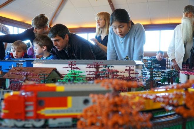 Families looking at lego creations