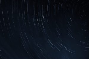 Long exposure timelapse photo of starry sky