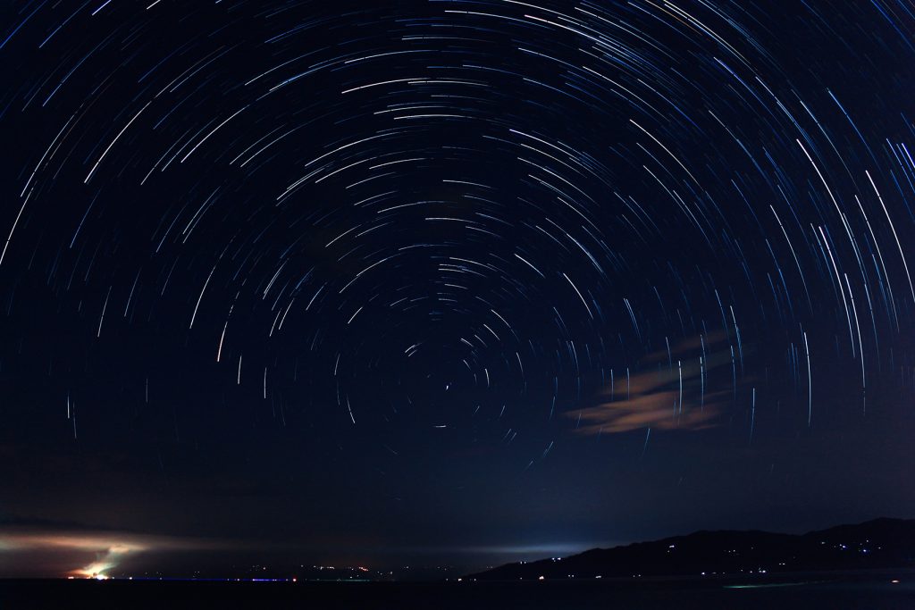 Long exposure timelapse photo of starry sky