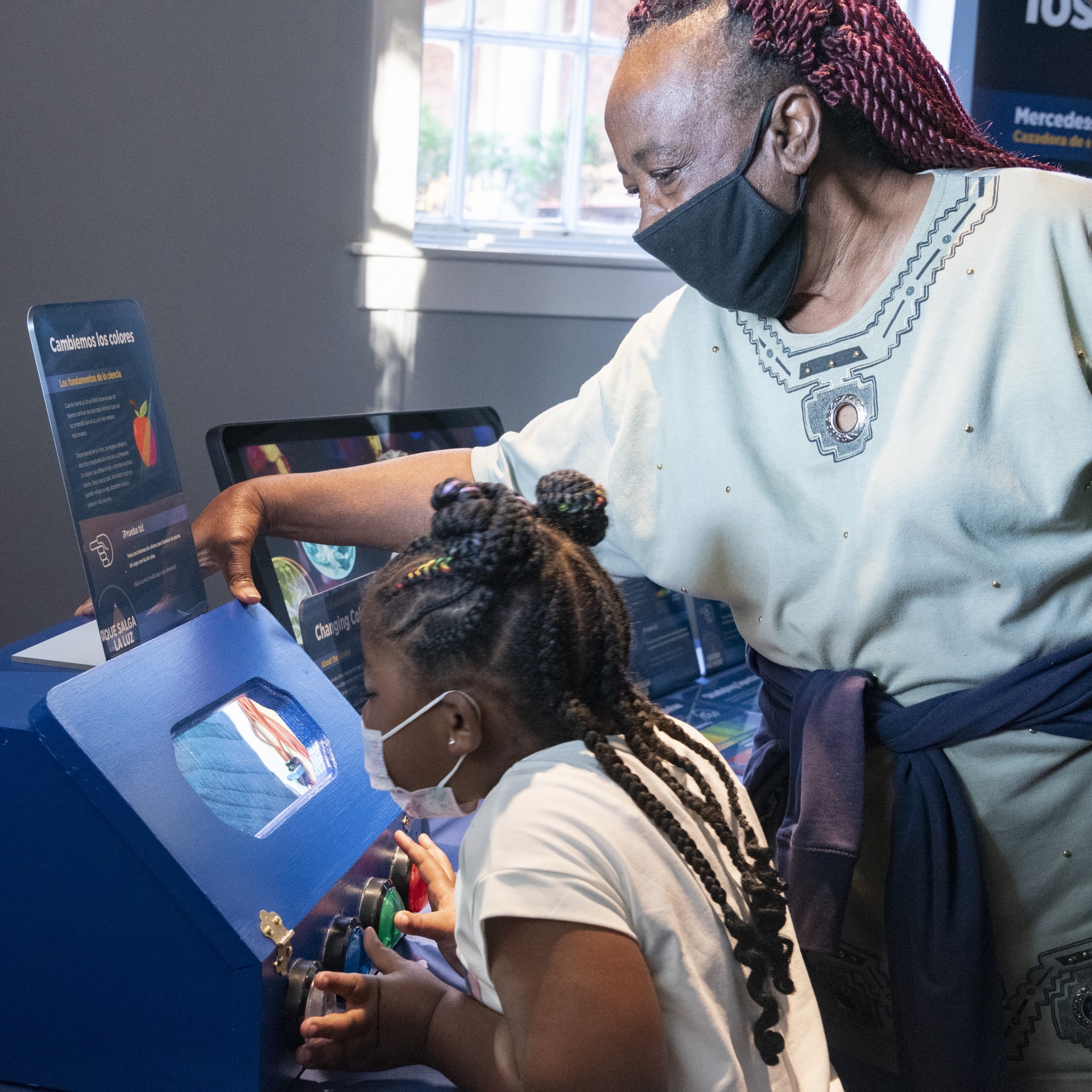 museum goers explore exhibit