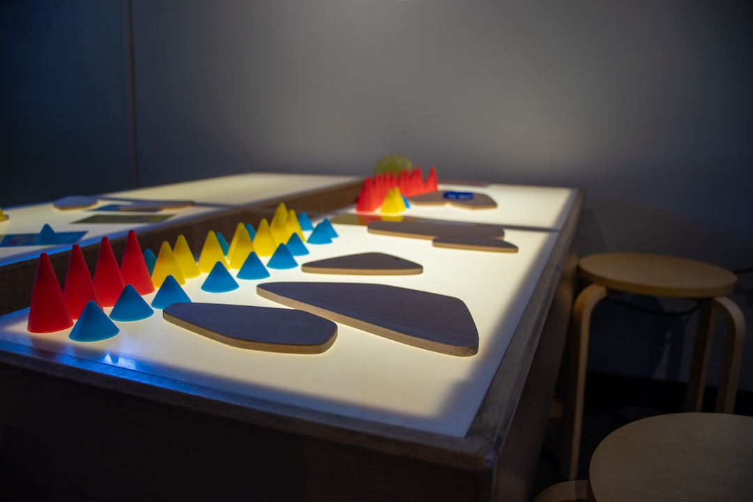 An LED light table with building shapes. 