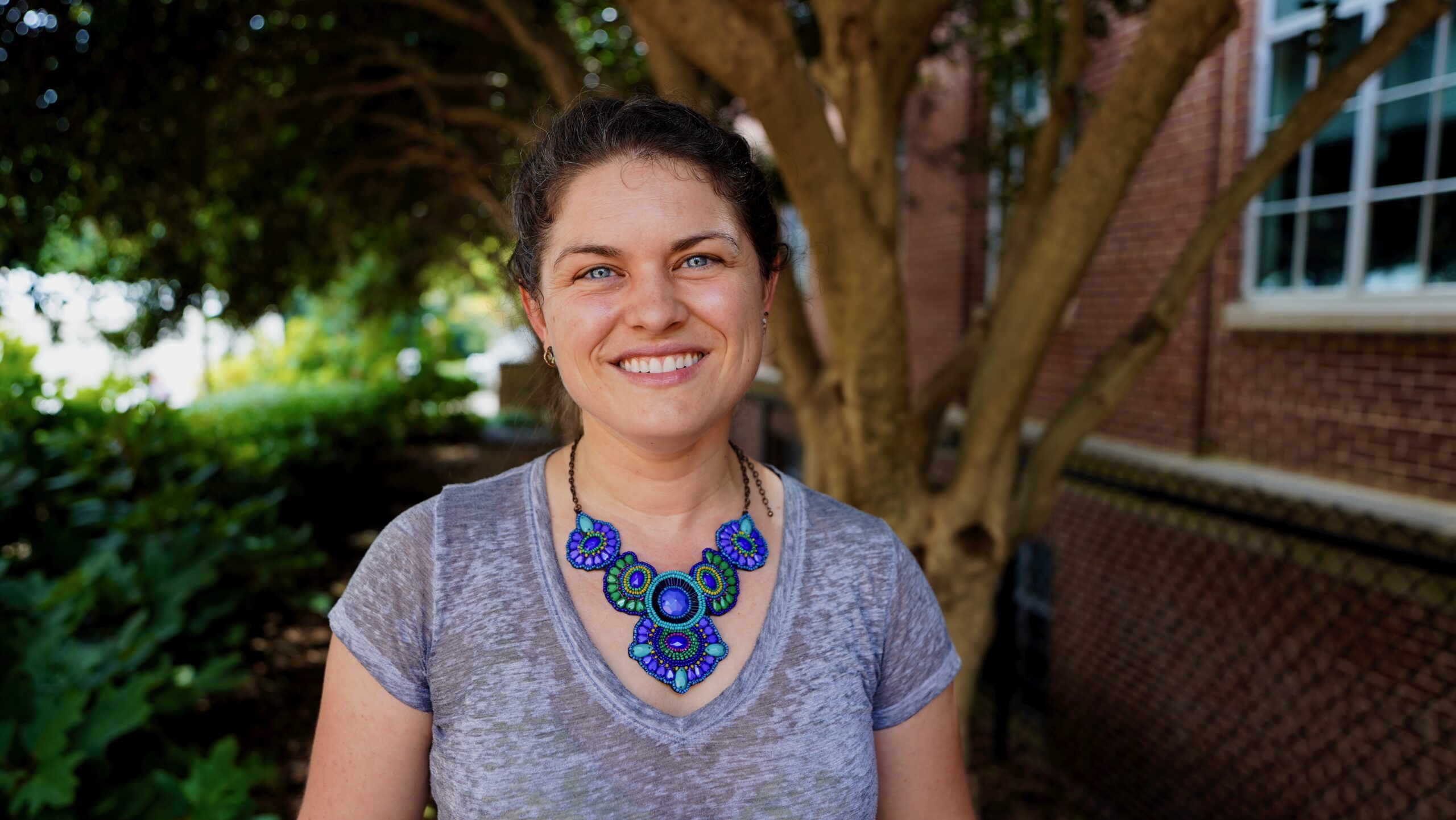 Dr. Erin McKenney smiles in a professional headshot.